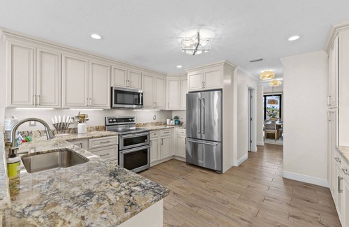 Bayshore Gardens House | Luxury Beachfront Retreat~Pool~Game Room~Sleeps 16
