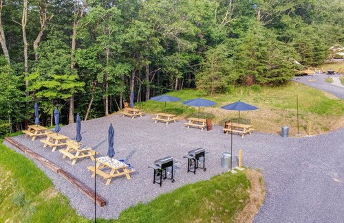 Great Cacapon RV Rental | Luxury Camping with King Bed - Aster Tent