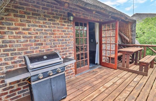 Marloth Park Ski Chalet | Luxury chalet 12 mi from the Crocodile Bridge Gate of the Kruger National Park!