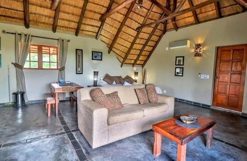 Marloth Park Ski Chalet | Luxury chalet 12 mi from the Crocodile Bridge Gate of the Kruger National Park!