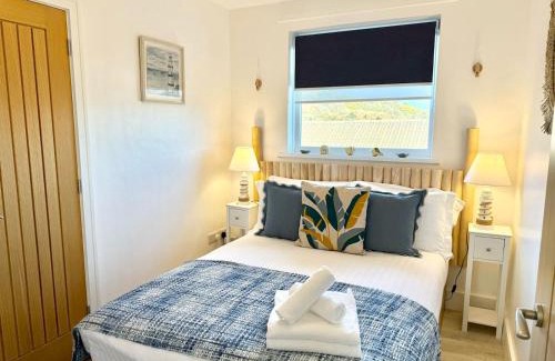 Mumbles House | Luxury Coastal Escape with Mumbles Lighthouse View Pass the Keys