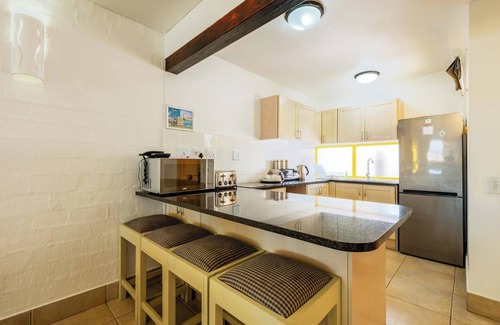 Mykonos Apartment | Luxury Coastal Escape | Balcony | Pool | Sea View