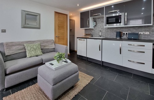 Llanfair Talhaiarn House | Luxury Cottage with Hot tub in a lovely village setting