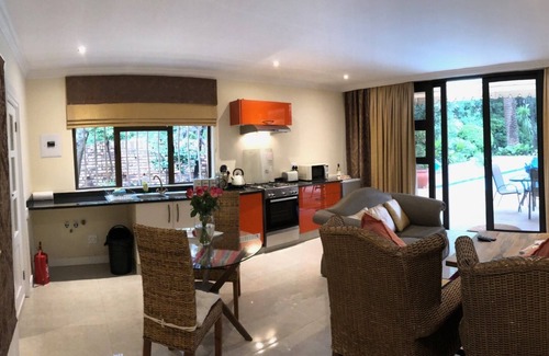 Bedfordview Apartment | Luxury Executive Apartment Overlooking Beautiful Pool & Garden