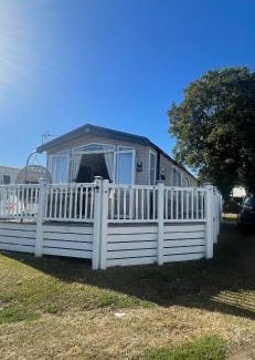 Isle of Grain Apartment | Luxury family Caravan with decking and a sea view at Kent coast sleeps 6