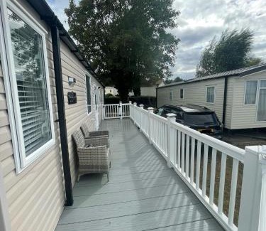 Isle of Grain Apartment | Luxury family Caravan with decking and a sea view at Kent coast sleeps 6