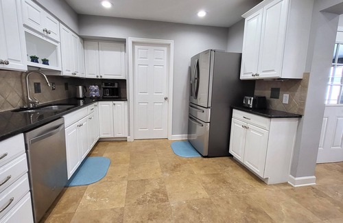 Disston Heights House | Luxury heated pool and hot tub vacation house