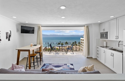 Fluvial Vallarta Condo | Luxury High Rise Condo just Steps Away from the Beach!