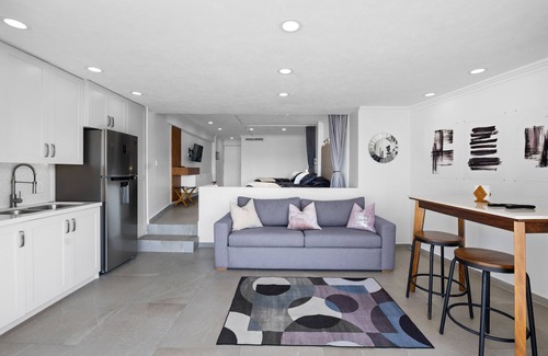 Fluvial Vallarta Condo | Luxury High Rise Condo just Steps Away from the Beach!