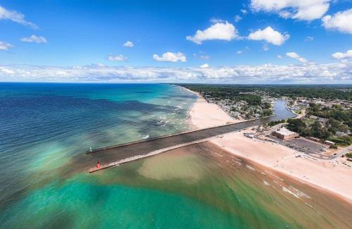 South Haven House | Luxury Home with Harbor Views Hot Tub Walk to North Beach Dog Friendly
