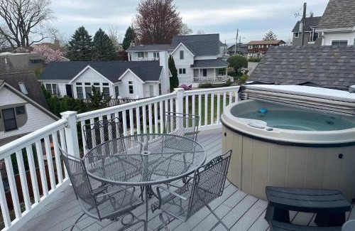 South Haven House | Luxury Home with Harbor Views Hot Tub Walk to North Beach Dog Friendly