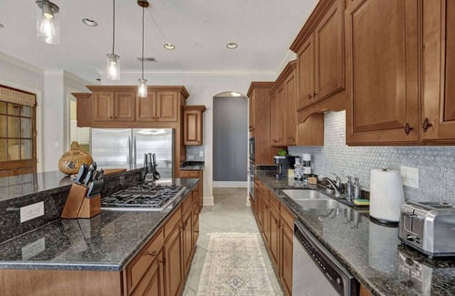 Central Gardens House | Luxury home with outdoor patio and game room