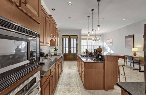 Central Gardens House | Luxury home with outdoor patio and game room