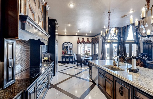 Lubbock House | Luxury home with private pool, waterslide, grill, home theater, & office