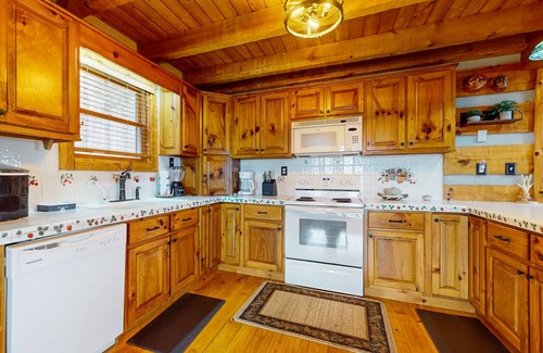 Baneberry Cabin | Luxury lakefront cabin with free attraction tickets, fire pit, dock & deck