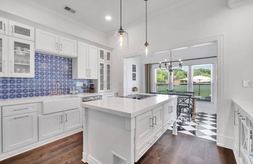 Denver House | Luxury lakefront living w/dock, pub, game rm