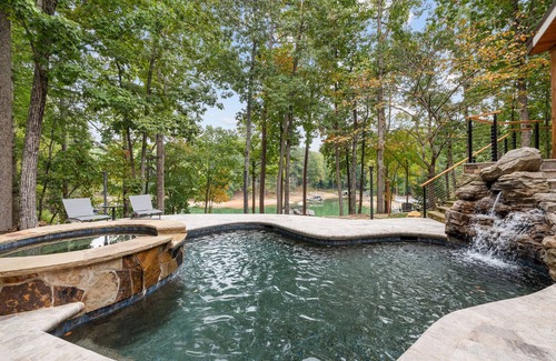 Buford House | Luxury Lakefront retreat. Privacy gate, pool and outdoor kitchen