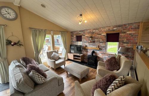 Tattershall House | Luxury Lakeside Lodge L1 with hot tub situated at Tattershall Lakes Country Park