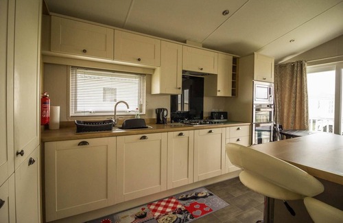 Hunstanton Cabin | Luxury lodge with decking in Hunstanton at Manor Park ref 23144K