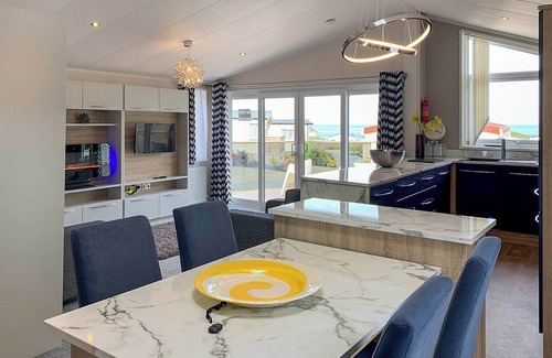 Tan-y-groes Ski Chalet | Luxury lodge with a modern open-plan living space.