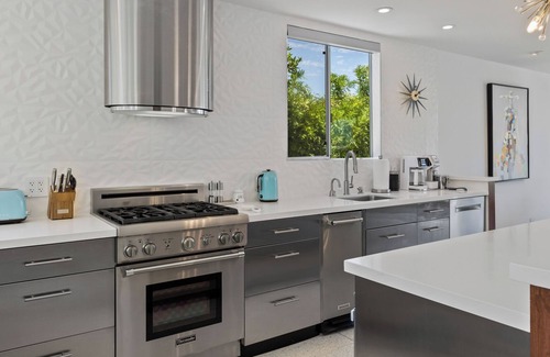 Magnesia Falls Cove House | Luxury Mid Century Modern in the Heart of the Desert is waiting for you!