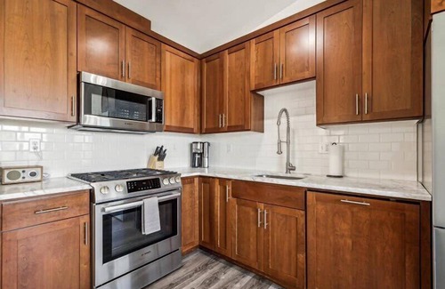 Buckman Neighborhood Apartment | Luxury Penthouse with Stunning Views & Fireplace