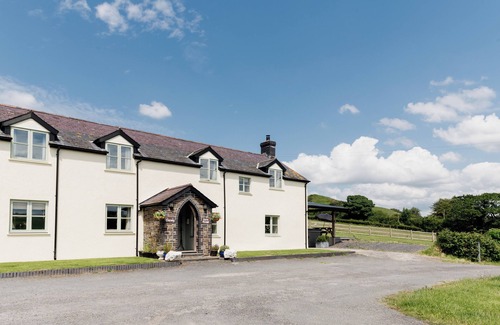 Devils Bridge House | Luxury renovated barn + countryside farmhouse with large hot tub sleeping 50