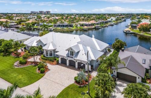 Pelican House | Luxury Resort-Style Saltwater Pool Home in SW Cape Coral
