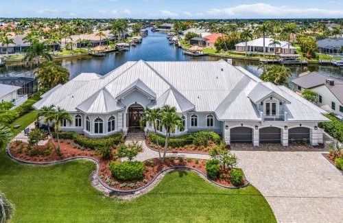 Pelican House | Luxury Resort-Style Saltwater Pool Home in SW Cape Coral
