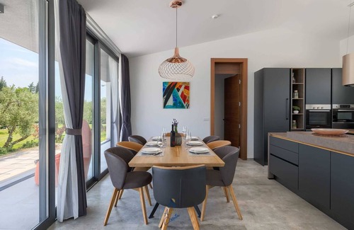 Rakalj Villa | Luxury retreat for 8 guests, with pool surrounded by olive trees