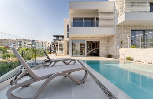 Krk Villa | Luxury semidetached villa Smokva 1 - near the center and sea - by TRAVELER tourist agency Krk