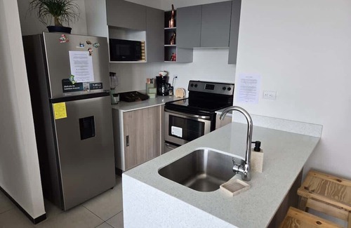 Zona 11 Apartment | Luxury Skyline Volcano View KING Bed FREE Pool Gym