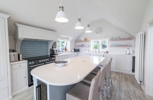 Rhoscolyn House | Luxury stay for 14 guests. Hot tub, tennis court and sea view