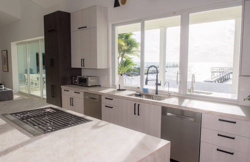 Islamorada Villa | Luxury Waterfront Home with Sandy Beach, Hot Tub and Theater