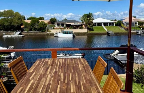 Bongaree House | Luxury Waterfront Retreat: Pet friendly Canal Home with Jetty on Bribie Island!