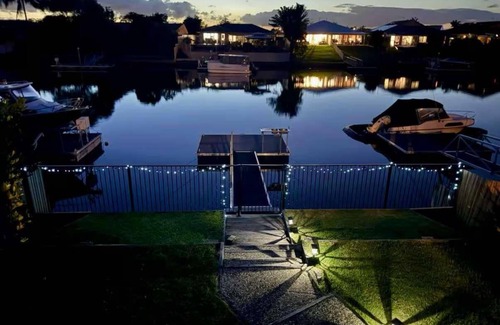 Bongaree House | Luxury Waterfront Retreat: Pet friendly Canal Home with Jetty on Bribie Island!