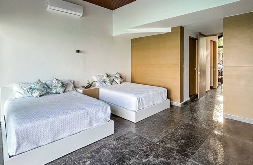 Mario Villanueva Madrid Villa | Luxury waterfront villa with dock, pool, hot tub, outdoor areas, & billiards