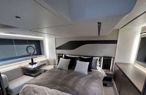 Lower Swanwick Boat Rental | Luxury yacht moored in a tranquil marina setting