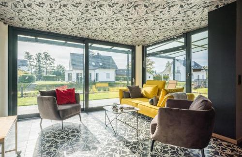 Krakow am See Apartment | Luxus FeWo 122 m² direkt am Wasser mit Boot