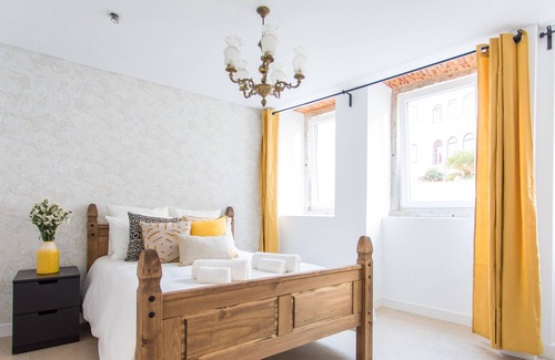 Santo Amaro Apartment | Lx Factory Design Lemon Style with a Cute Yard