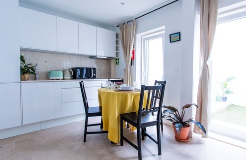 Santo Amaro Apartment | Lx Factory Design Lemon Style with a Cute Yard