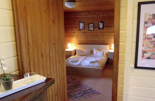 Siemensstadt House | Lying on a peninsula holiday home in Swiss Cottage style