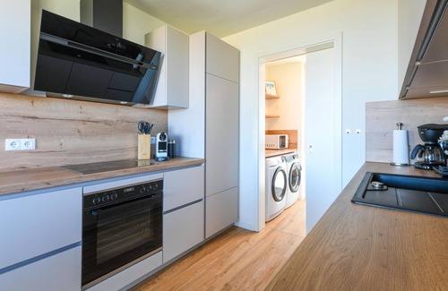 Marienleuchte Apartment | Lykke vacation apartment - pure sea view. Sauna. Family-friendly.