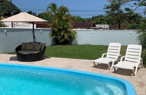 Matinhos House | M&M House - Casa com Piscina e Ar Condicionado em Matinhos