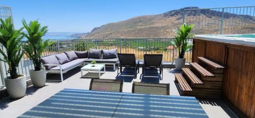 Migdal House | Magdala Infront Sea of Galilee and Mount Harbel