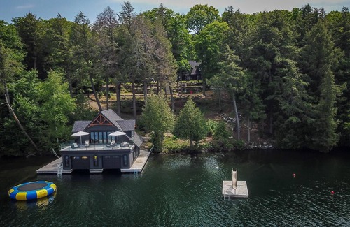 Seguin Cottage | Magnificent 6bdrm 8bath luxury on Lake Joe! Hot Tub! Gym! Boathouse!