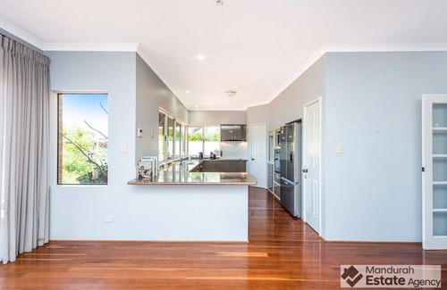 Halls Head Boat Rental | Magnificent canal home with stunning views down the full length of the canal.