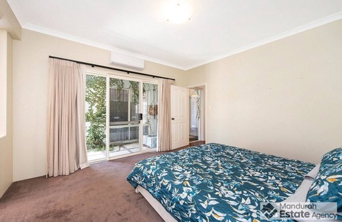 Halls Head Boat Rental | Magnificent canal home with stunning views down the full length of the canal.