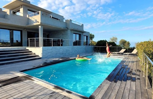 Tarcu House | Magnificent contemporary house with 180° sea and mountain views, not overlooked