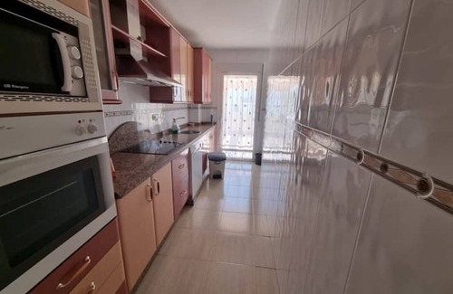 Nuevo Portil Apartment | Magnificent apartment with a spectacular terrace 5 minutes from the beach.